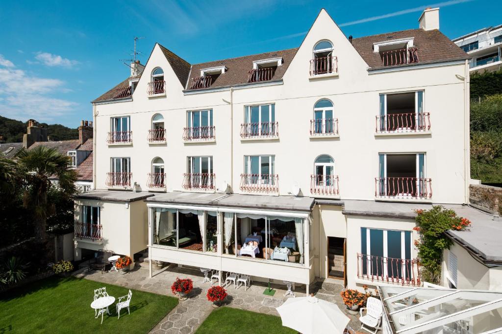 an aerial view of a large white building at The Panorama in Saint Aubin