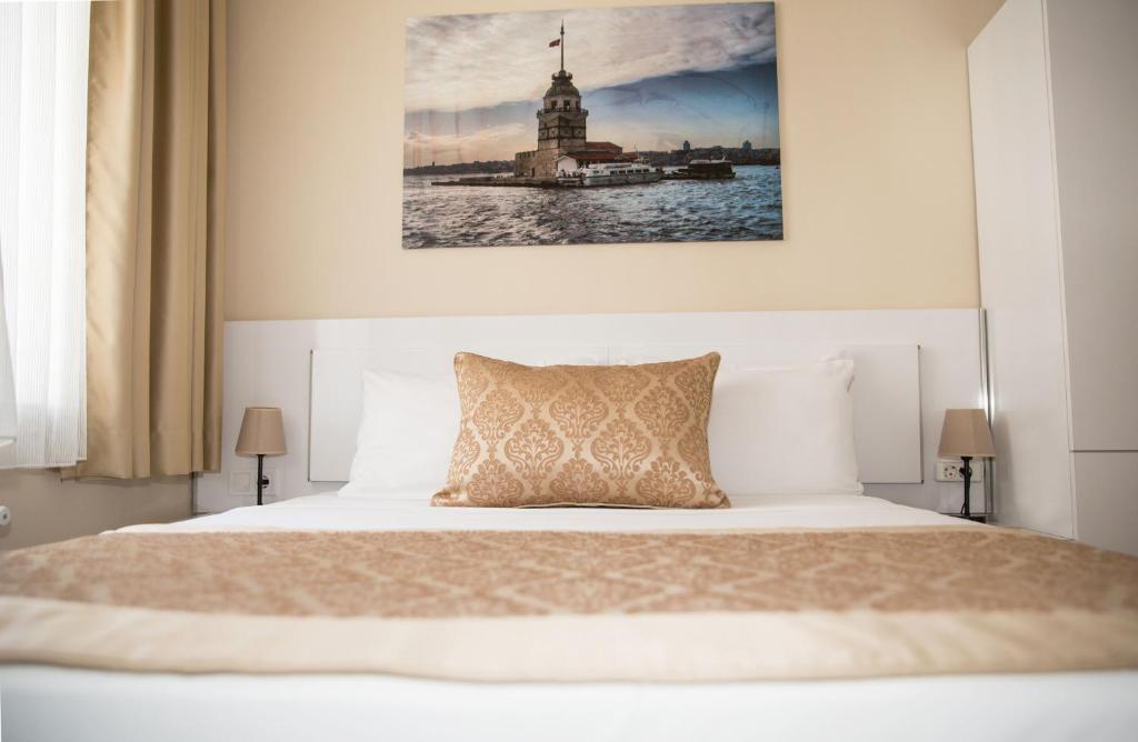 Postel nebo postele na pokoji v ubytování Lavanta Hotel