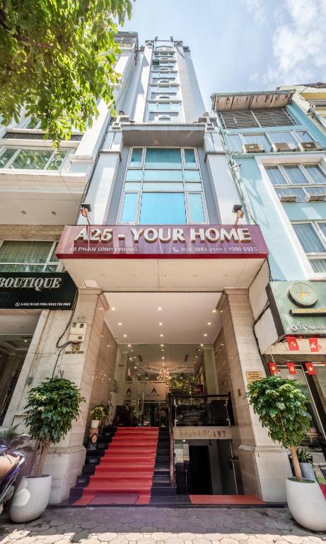 a view of a building with a red staircase at A25 Hotel - 19 Phan Đình Phùng in Hanoi