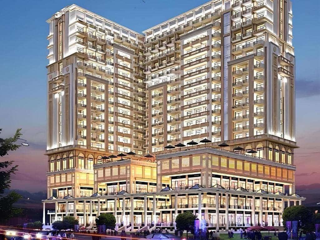 a rendering of a large building at Kaveri Stay in Greater Noida