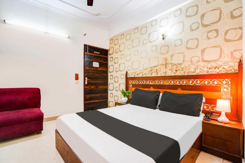 Ένα ή περισσότερα κρεβάτια σε δωμάτιο στο Collection O Paharganj