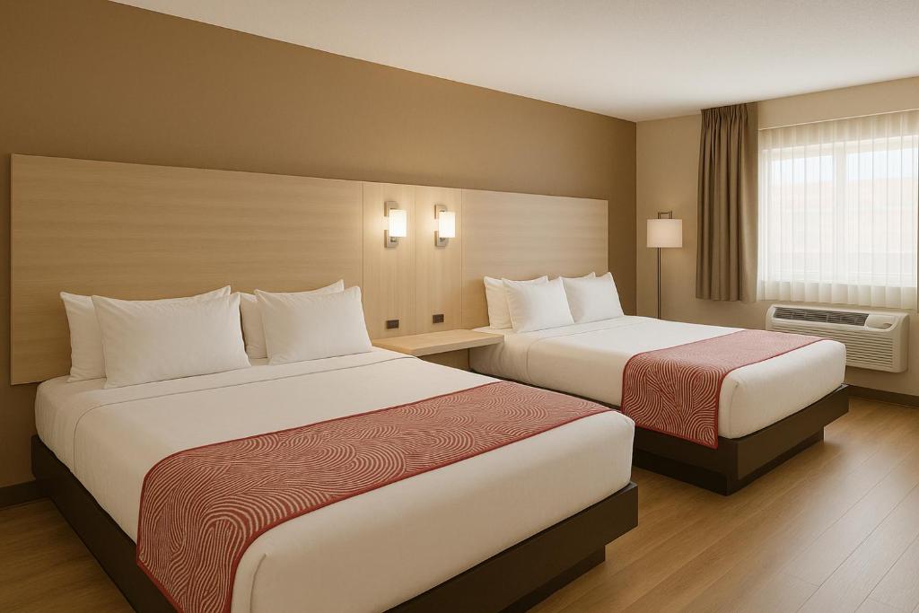 En eller flere senge i et værelse på Floral Park Motor Lodge