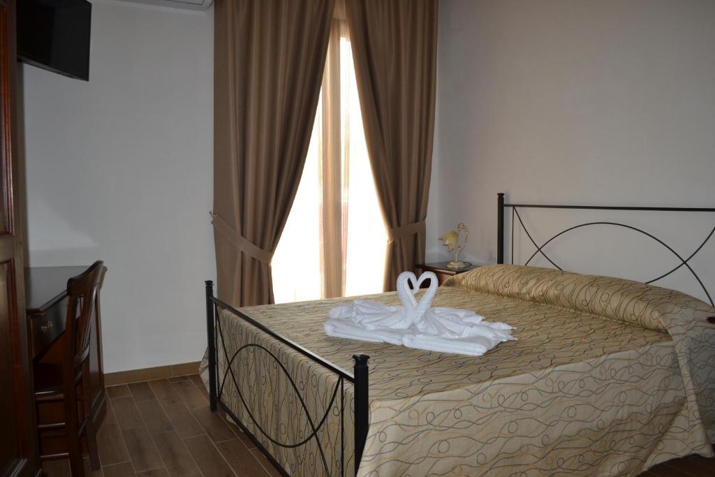Postel nebo postele na pokoji v ubytování B&B Castiglione