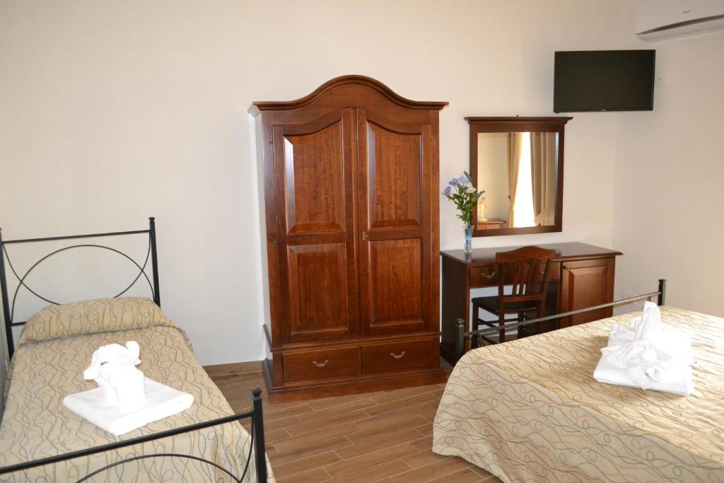 Postel nebo postele na pokoji v ubytování B&B Castiglione