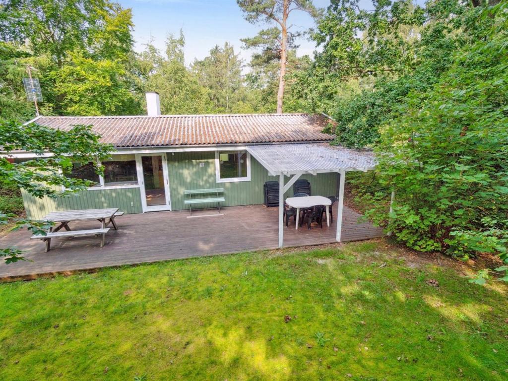 an overhead view of a house with a wooden deck at Holiday Home Joske - 250m from the sea by Interhome in Hasle