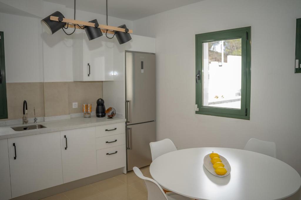 Η κουζίνα ή μικρή κουζίνα στο Villa Limonero