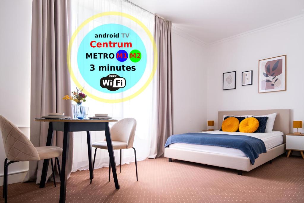 En eller flere senge i et værelse på Central Avenue by Arrenda