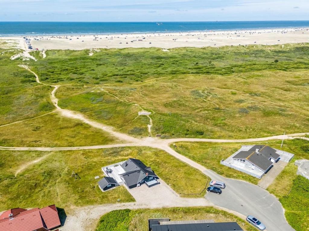 an aerial view of a house and the beach at Holiday Home Betti - 200m from the sea by Interhome in Lakolk