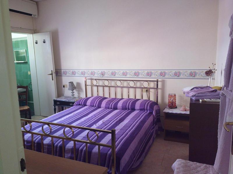 Postel nebo postele na pokoji v ubytování Hotel Delhy