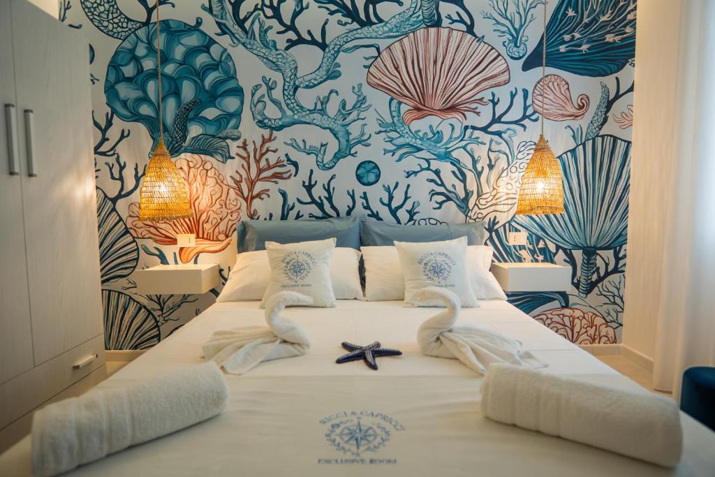 Ένα ή περισσότερα κρεβάτια σε δωμάτιο στο Ricci & Capricci Exclusive Room