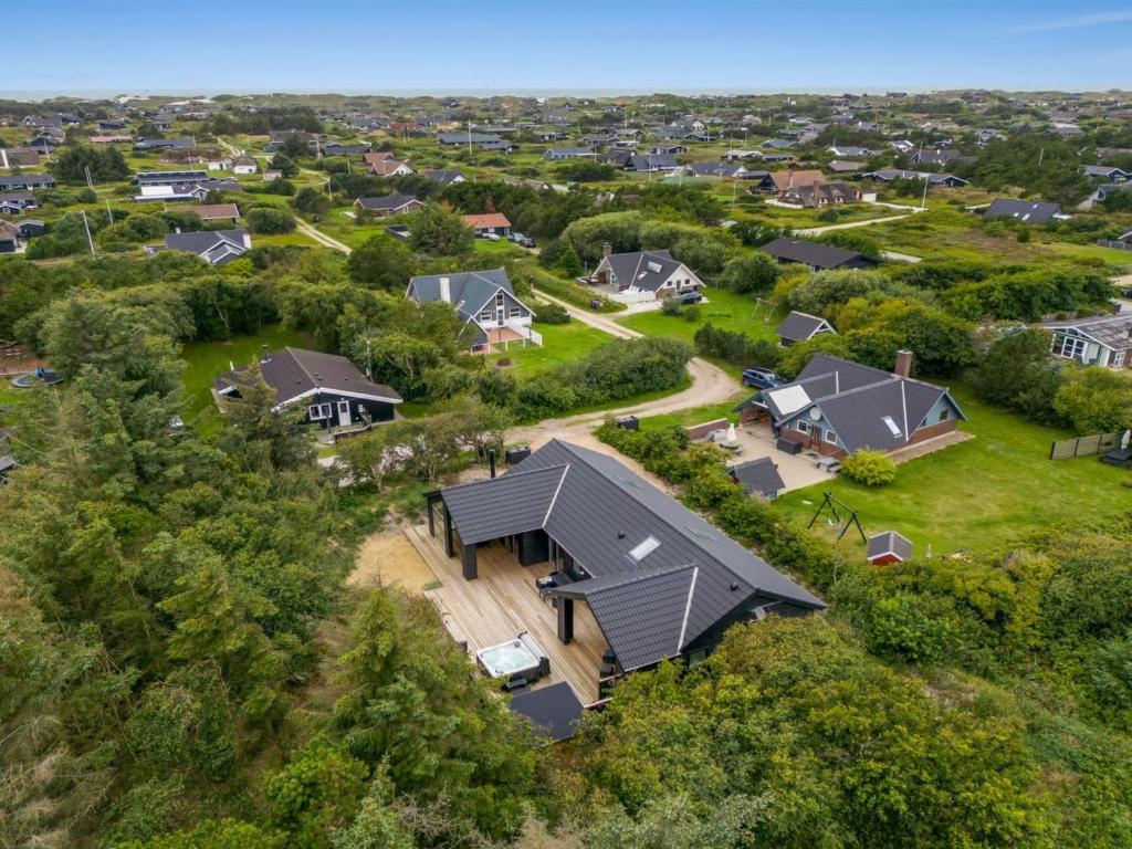 an overhead view of a home with a gambrel roof at Holiday Home Edmond - 995m from the sea by Interhome in Ringkøbing