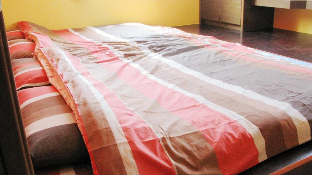Postel nebo postele na pokoji v ubytování Sea Front Homestay