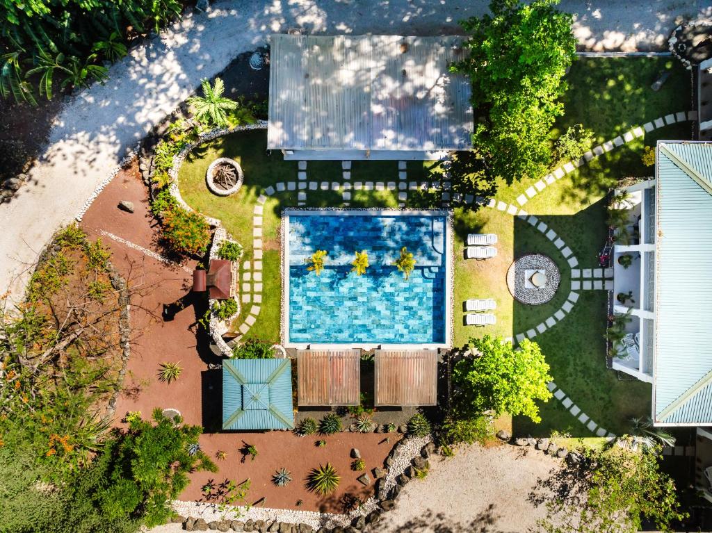 an overhead view of a swimming pool in a backyard at Buendía Lux Lotus Suite Hidden Gem Near Beach with Pool in Potrero