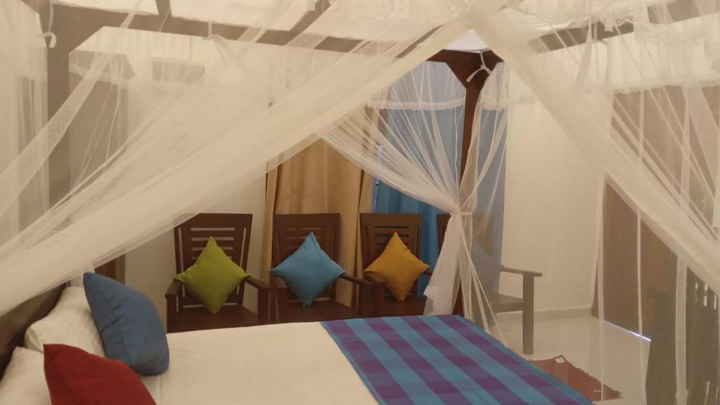 Postel nebo postele na pokoji v ubytování Villa 307A