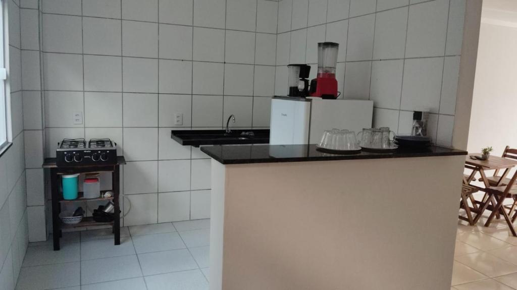 Η κουζίνα ή μικρή κουζίνα στο Flat Paulista 10