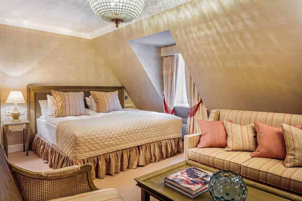 Voodi või voodid majutusasutuse Schlössle Hotel - Small Luxury Hotels of the World toas