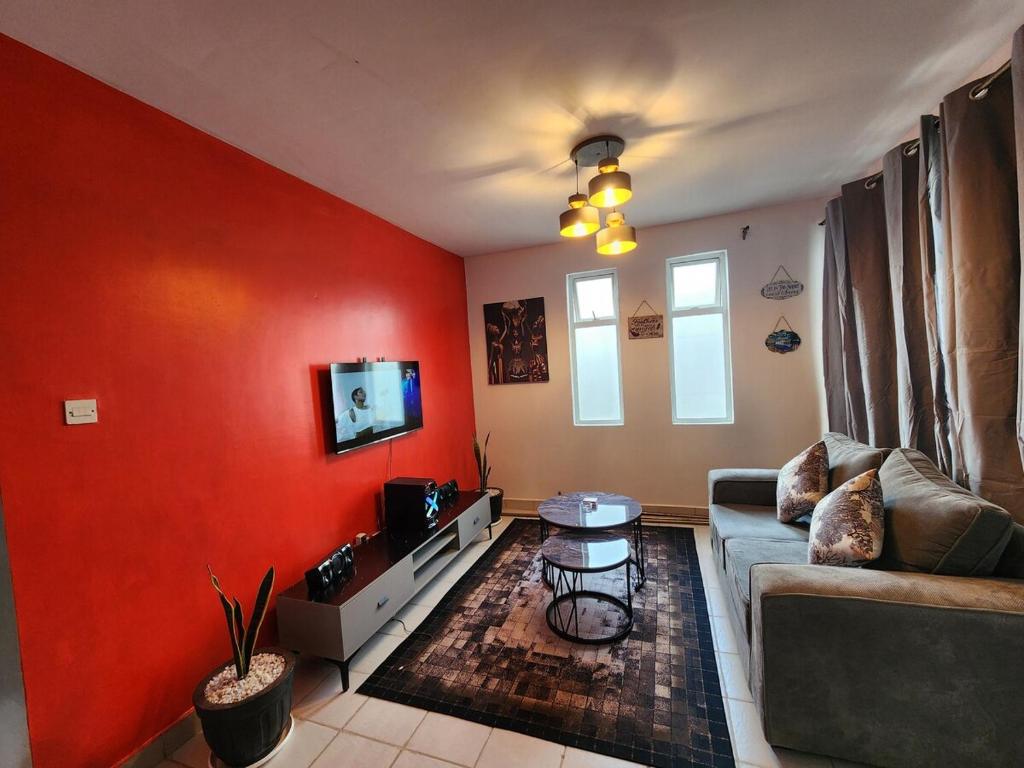 TV a/nebo společenská místnost v ubytování The Nest