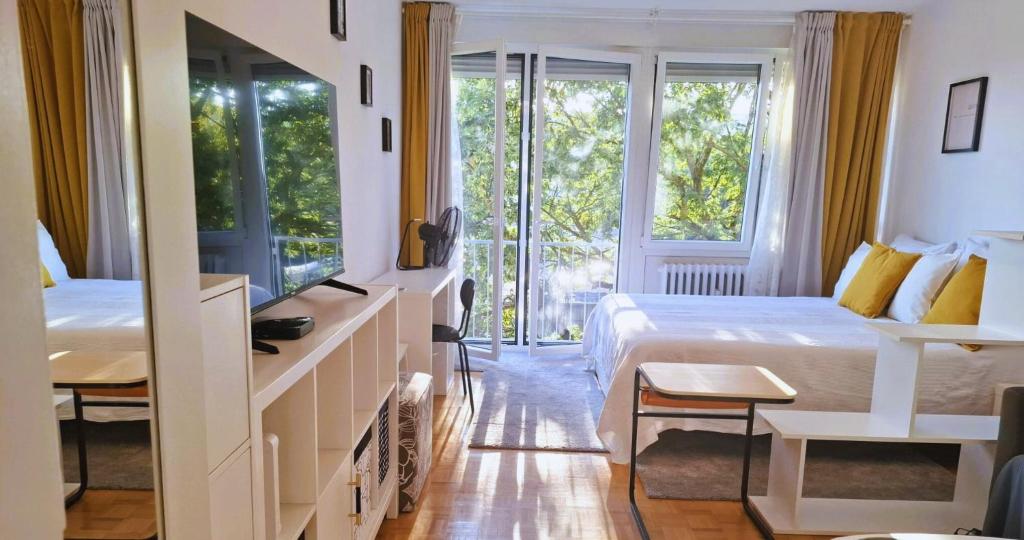 Katil atau katil-katil dalam bilik di White Door Zagreb self check-in apartment with free public parking