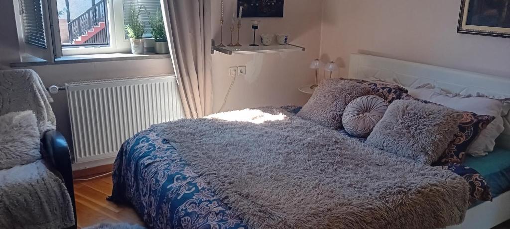 Ένα ή περισσότερα κρεβάτια σε δωμάτιο στο Apartment Baci for 4 guests