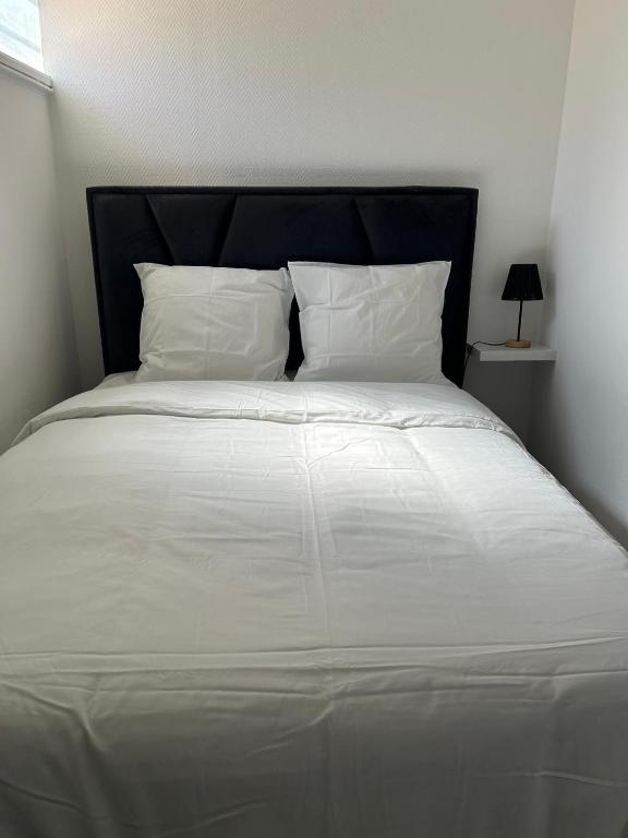 Ένα ή περισσότερα κρεβάτια σε δωμάτιο στο Maison ADAR 101