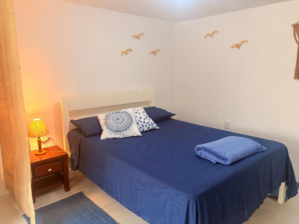 Postel nebo postele na pokoji v ubytování Quitinete para Casal em Garopaba