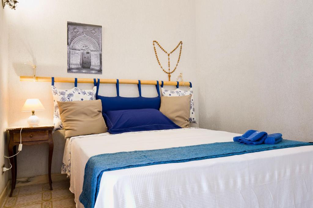 Postel nebo postele na pokoji v ubytování L'Onda