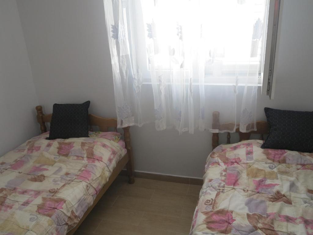 Postel nebo postele na pokoji v ubytování Apartment Tea&Lela