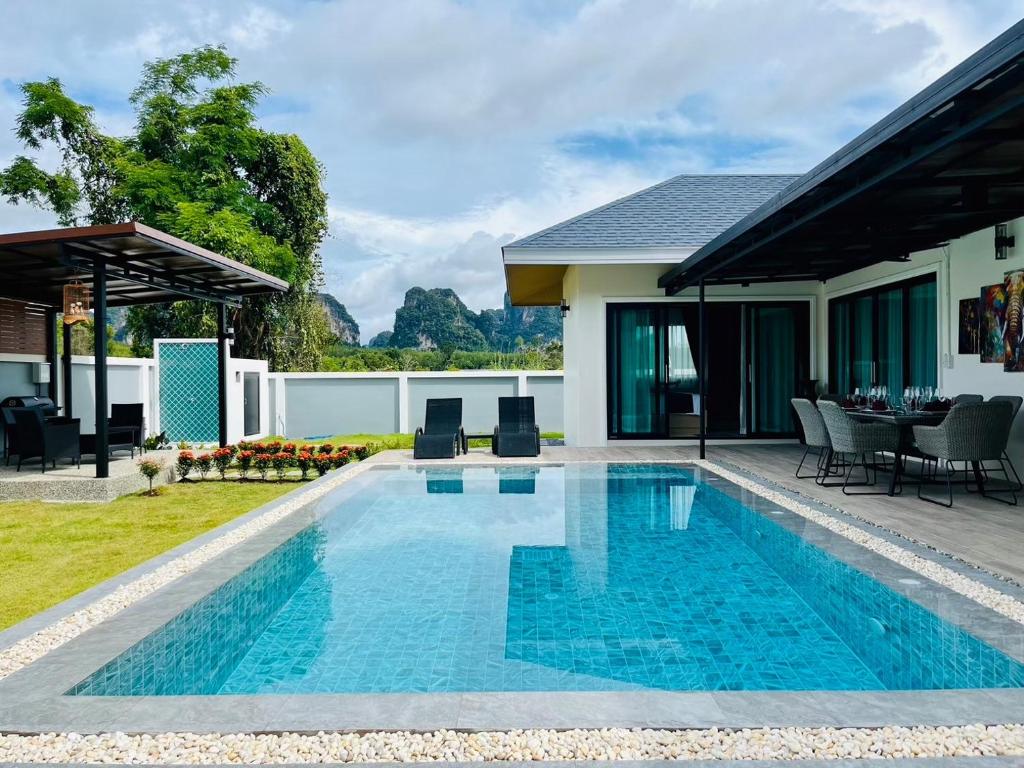 Πισίνα στο ή κοντά στο Leigh Villa