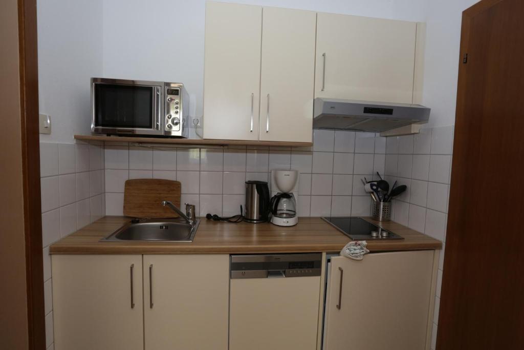 Kuchyň nebo kuchyňský kout v ubytování Pesentheinerhof