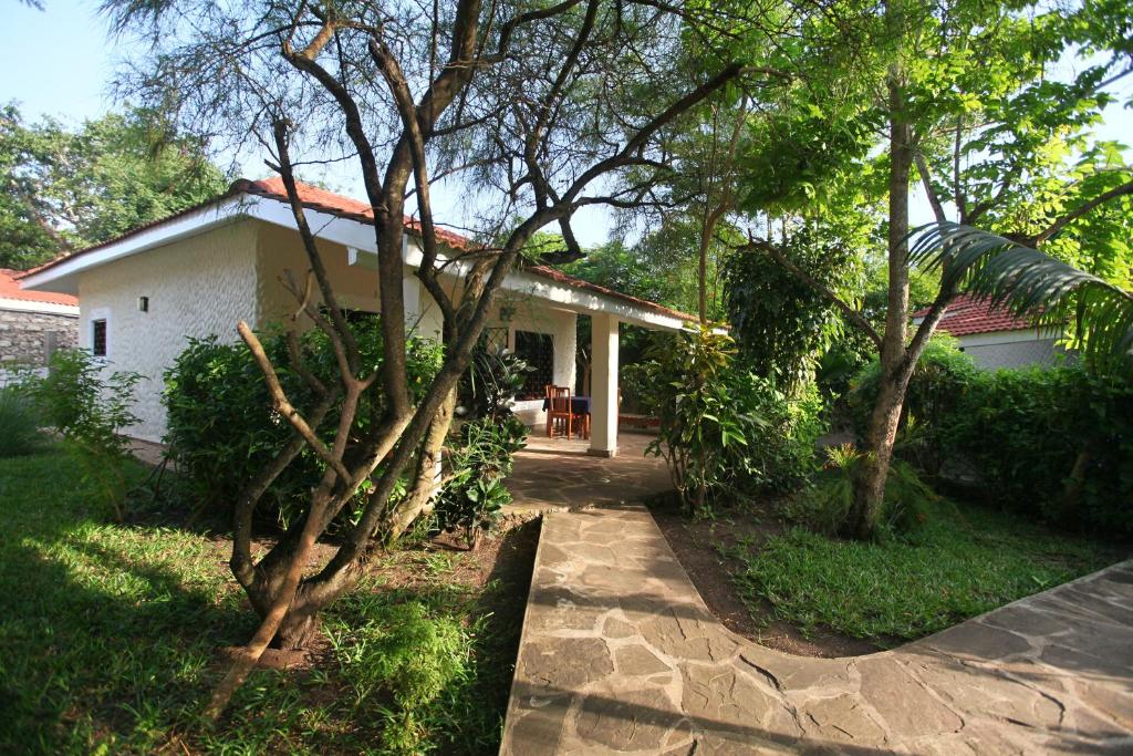 Zahrada ubytování Diani Cottages