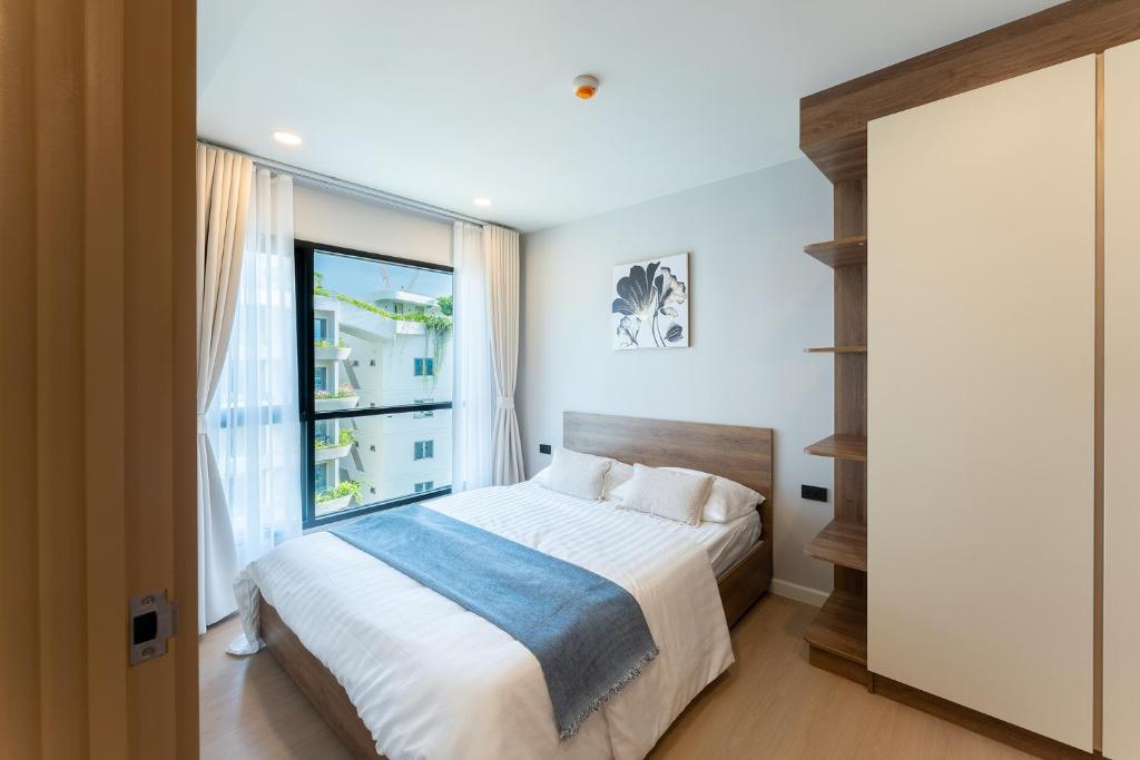 Ένα ή περισσότερα κρεβάτια σε δωμάτιο στο RJ Space