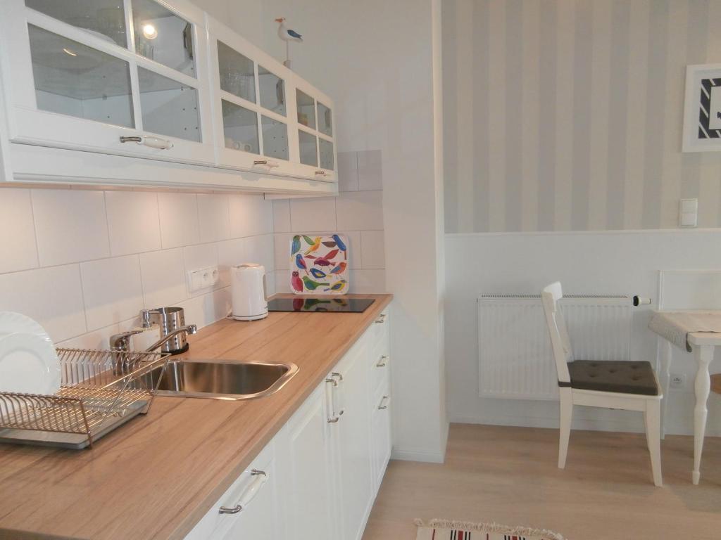 Küche/Küchenzeile in der Unterkunft Apartament Przy Plaży 3 Karwia