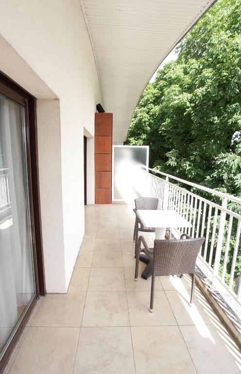 Balkón nebo terasa v ubytování Hôtel la Scala