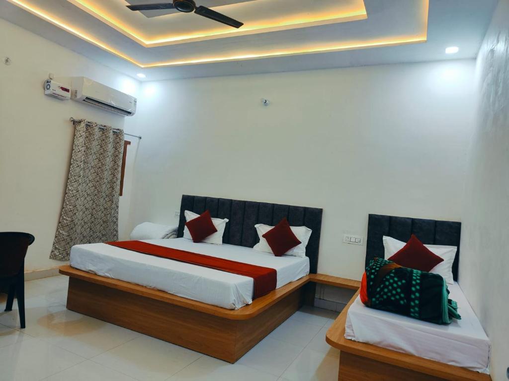 Una cama o camas en una habitación de Hotel Premium Residency