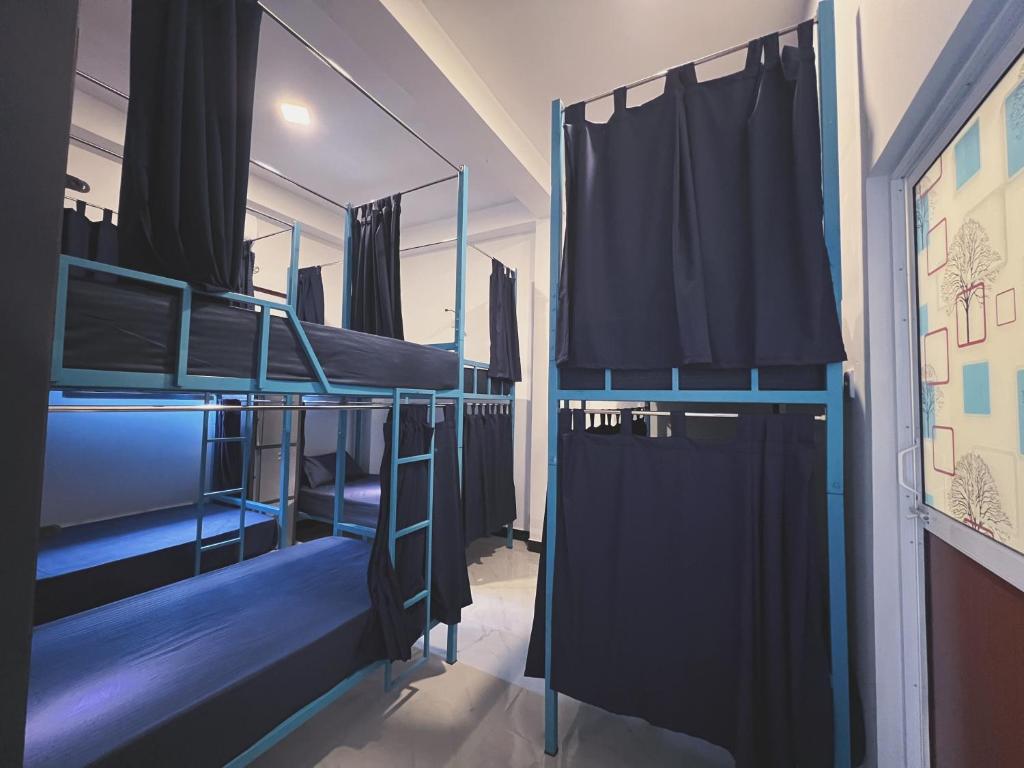 Postel nebo postele na pokoji v ubytování Island Wave Surf Hostel