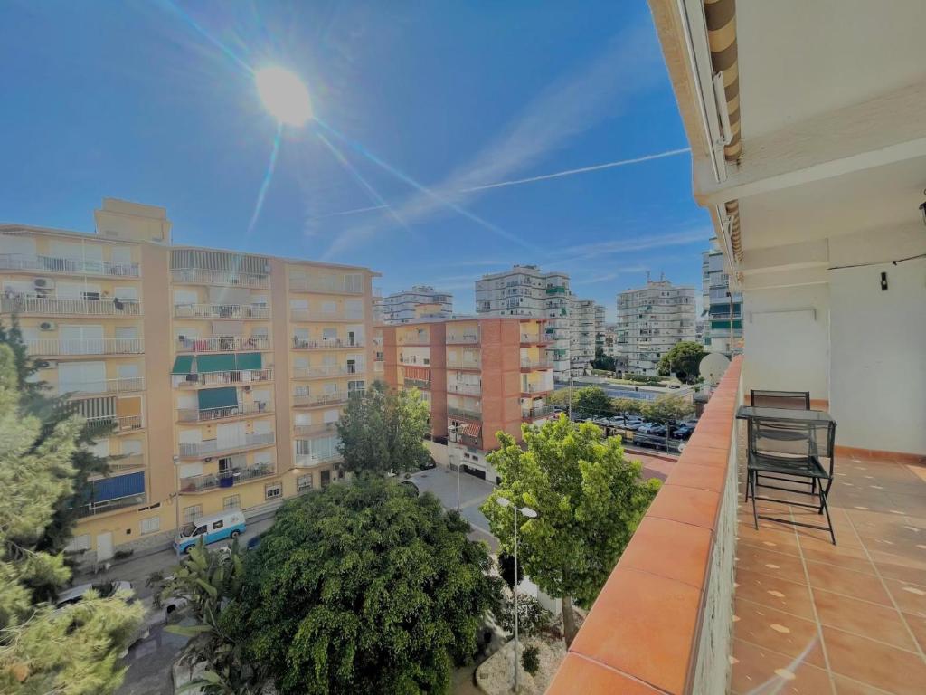 a balcony with a view of a city at Apartamentos Terrasol BARCO 5 in Torre del Mar