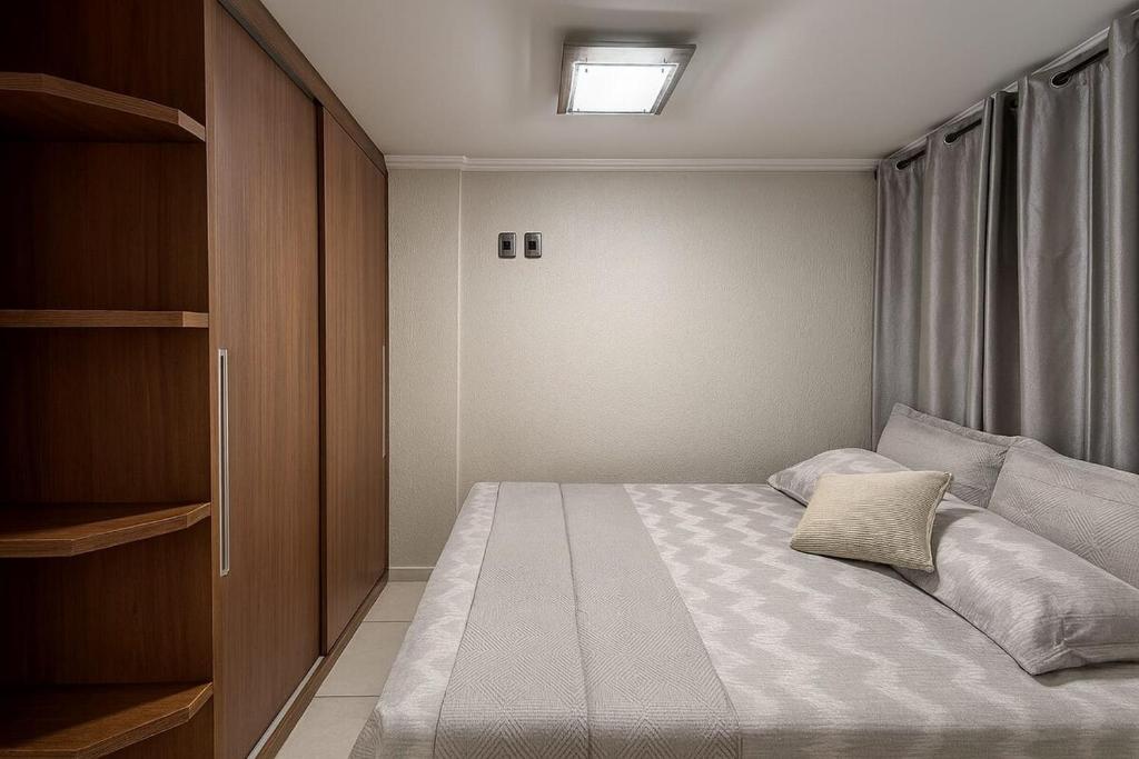 En eller flere senge i et værelse på CoBeach! Duplex à 3 minutos da praia!