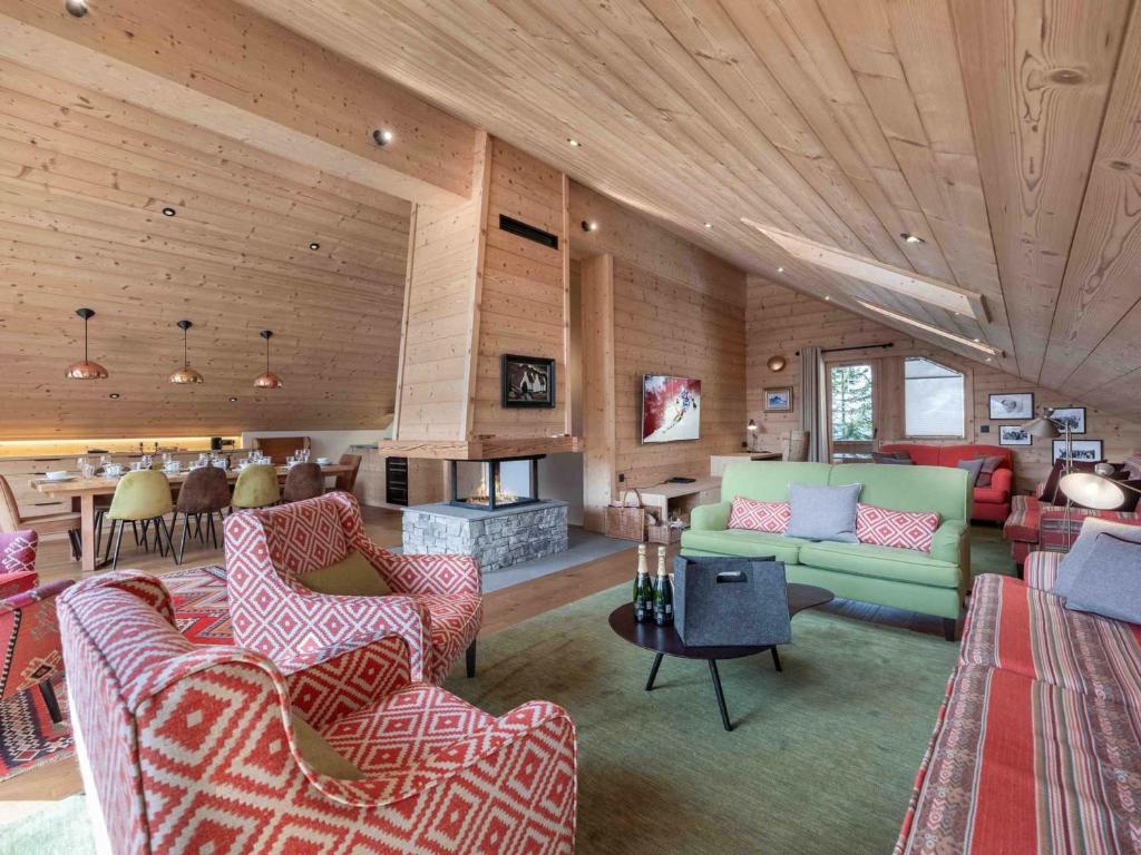 Posezení v ubytování Duplex 4 chambres au pied des pistes avec cheminée et WiFi à Méribel - FR-1-565-118