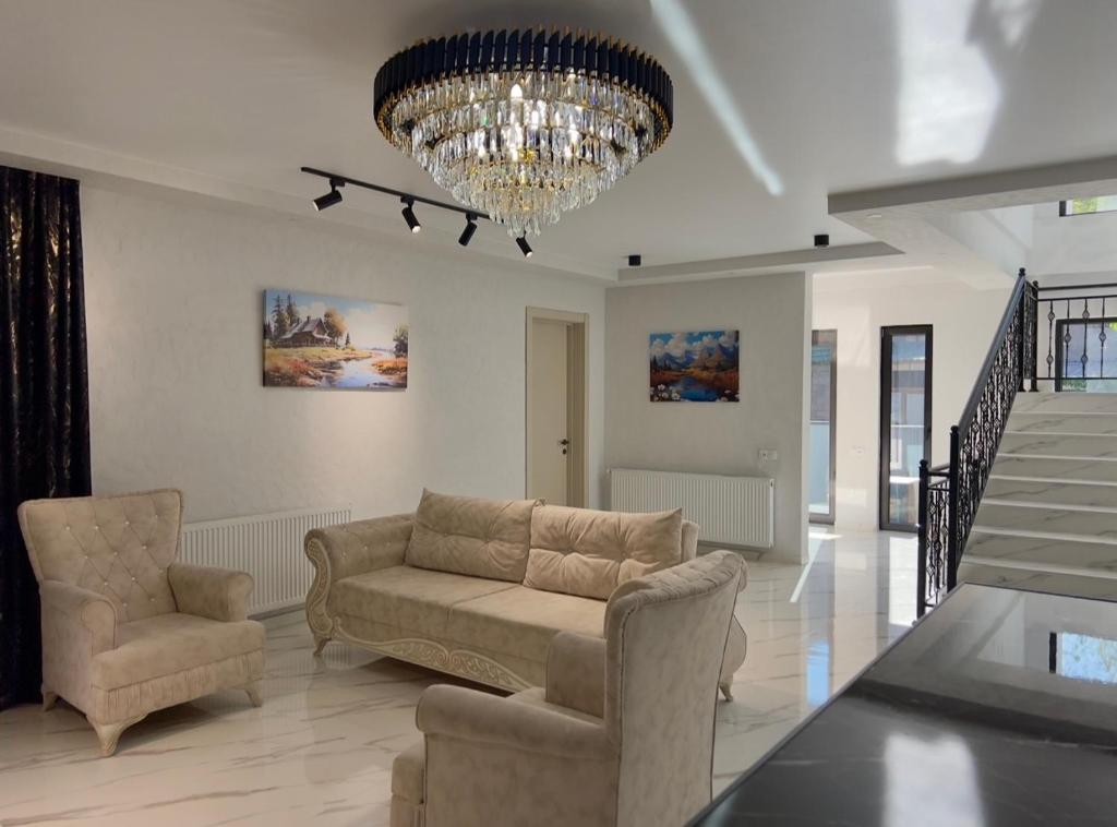 Coin salon dans l'établissement Visitor