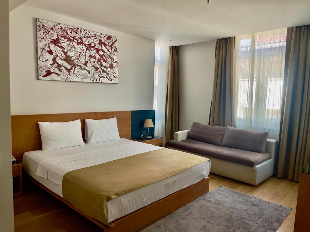 Ένα ή περισσότερα κρεβάτια σε δωμάτιο στο Misafir Suites 8 Istanbul