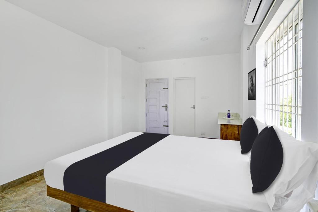 Φωτογραφία από το άλμπουμ του Hotel O Quilon Residency σε Perumanseri
