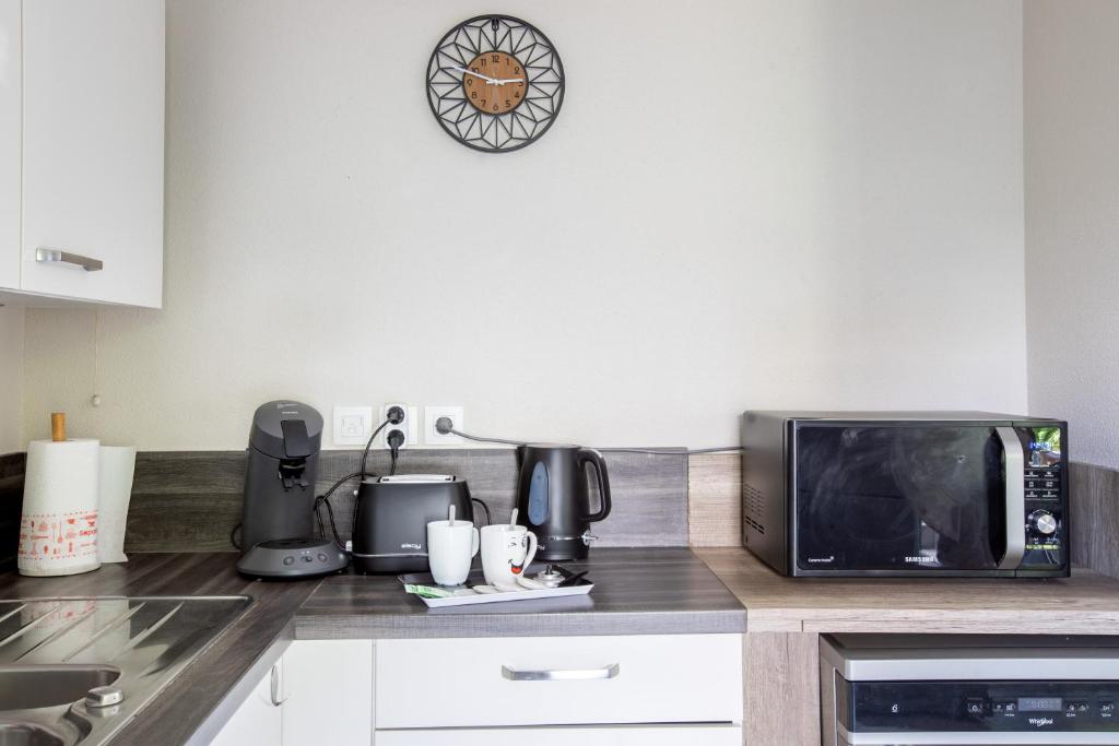 L'Adresse Colmarienne, Escapade en Famille, Terrasse, Garage Privé, Point de départ idéal en toutes saisons, Centre historique Colmar à 10 min à pied, Marchés de Noël, Route des vins d'Alsace, Appartement calme et élégant, Arrivée autonome, Garage à vélos – photo 18