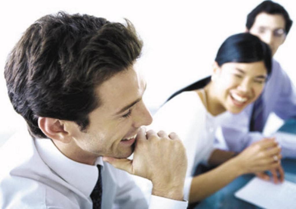 a group of three men sitting down and laughing at Holiday Inn Express Chengdu Wenjiang Hotspring by IHG in Chengdu