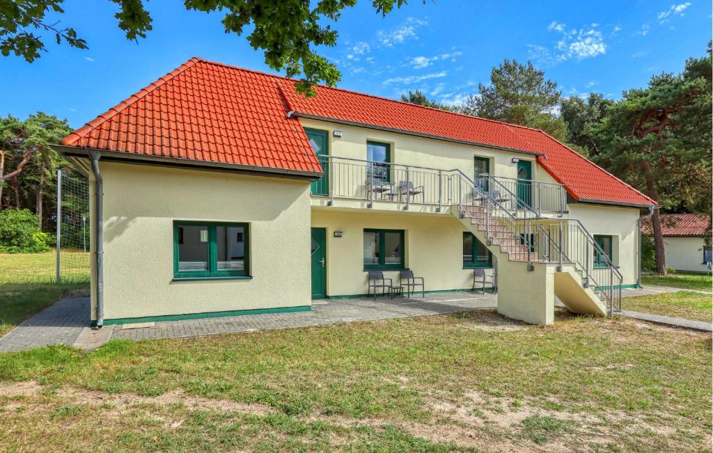 a house with an orange roof at Beautiful Apartment In Altenkirchen in Altenkirchen
