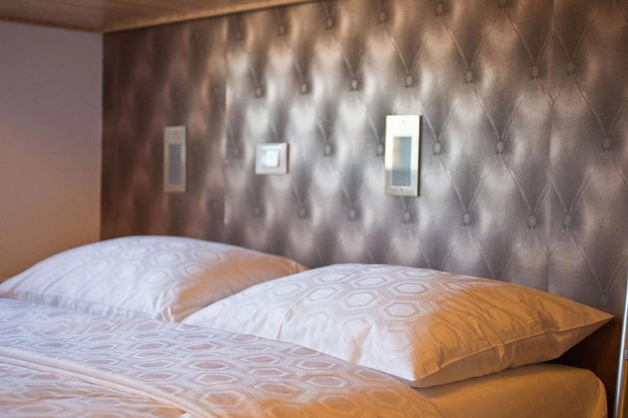 Postel nebo postele na pokoji v ubytování Bit Center Hotel