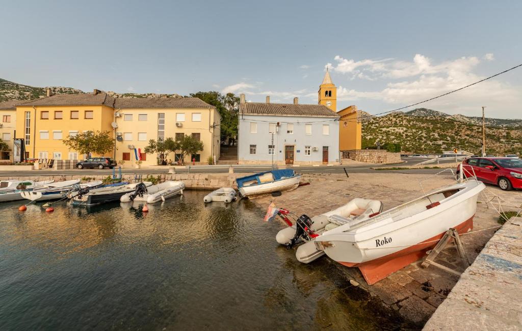 a group of boats are docked in a harbor at Gorgeous Apartment In Karlobag With Wifi in Karlobag