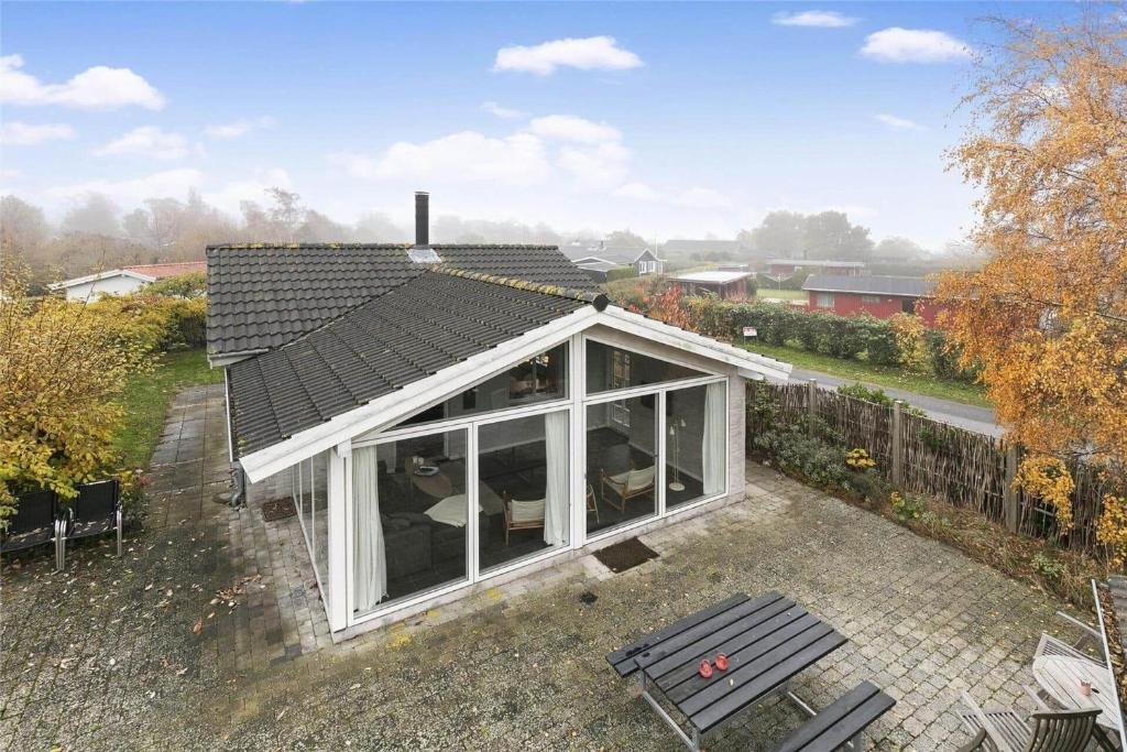 an overhead view of a house with a roof at N088-Karrebaeksminde-Baekkene-201-B in Karrebæksminde