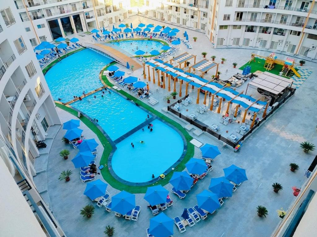an overhead view of a pool in a resort at Private Beach Chalet in Orabia in Hurghada