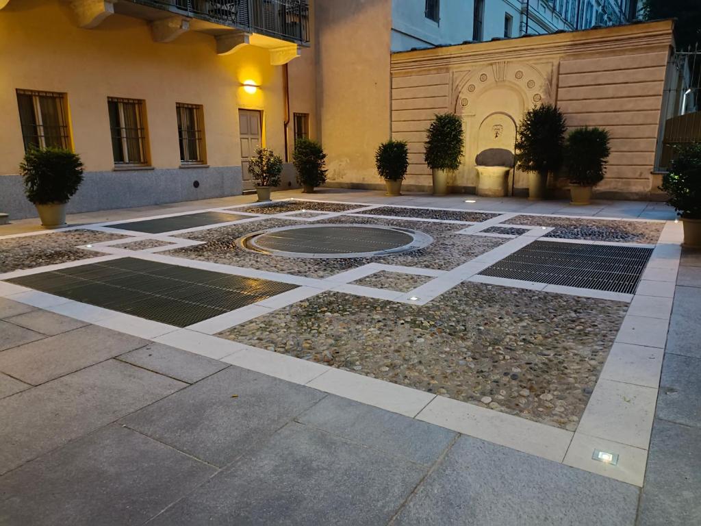 a courtyard of a building with a basketball court at Bogino 18 Apartment - Turin in Turin