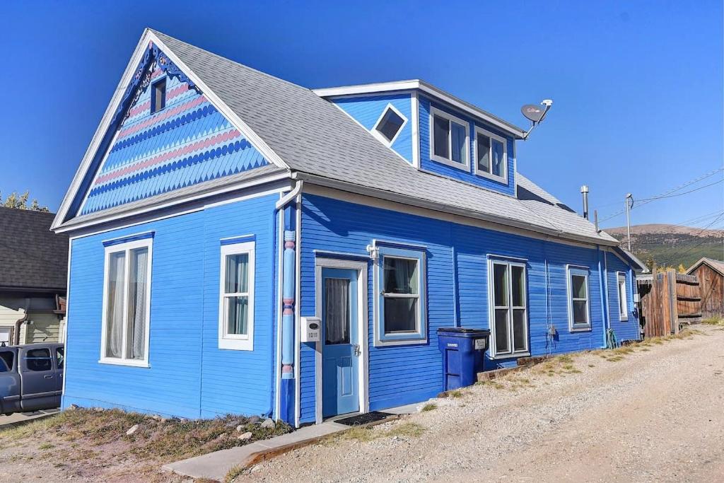 a blue house with a gray roof at 4BR Near Ski Cooper Mineral Belt - Pet Friendly in Leadville